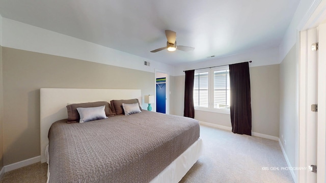 905 Burnham Ct, Aurora, IL 60502 - bedroom with light carpet and ceiling fan