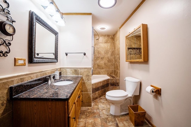 712 Mchenry Ave, Mchenry, IL 60050 - full bath featuring tiled shower / bath, vanity, stone finish flooring, and tile walls