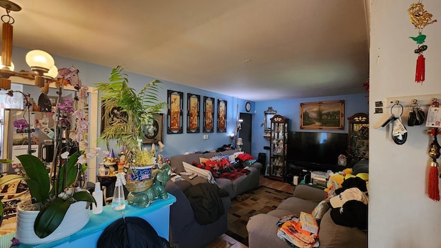 2637 Yeoman St, Waukegan, IL 60087 - living area featuring wood finished floors and a chandelier