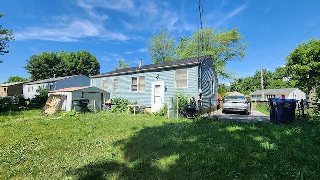 2637 Yeoman St, Waukegan, IL 60087 - rear view of house with a shed