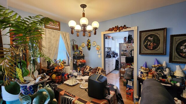 2637 Yeoman St, Waukegan, IL 60087 - dining area with a chandelier and wood finished floors