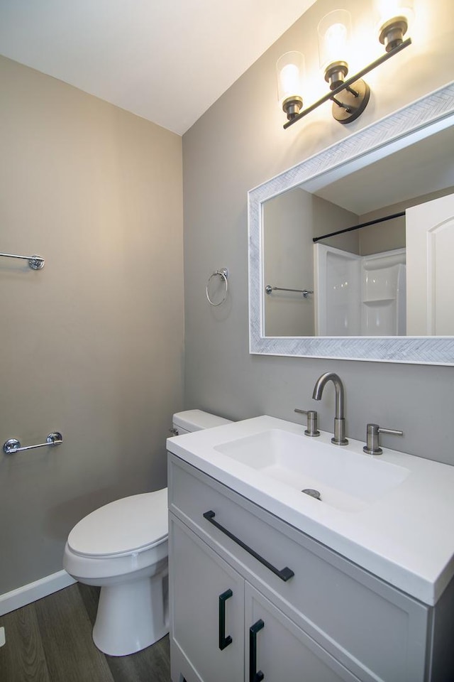 214 S Hickory St, Manteno, IL 60950 - bathroom featuring vanity and wood finished floors