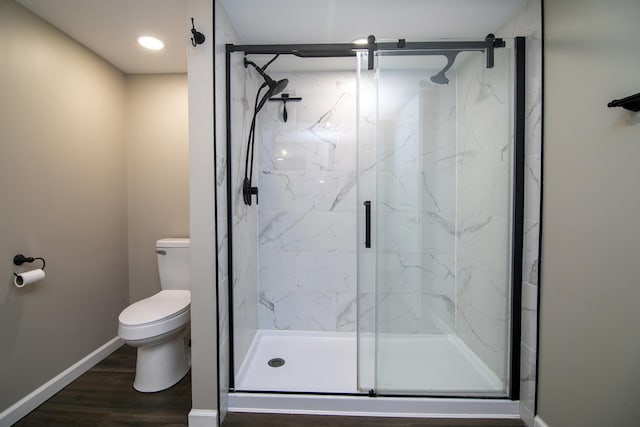 214 S Hickory St, Manteno, IL 60950 - bathroom with a marble finish shower and wood finished floors