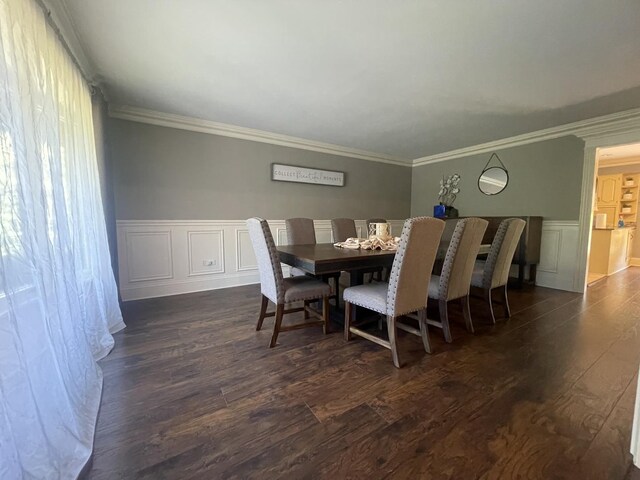 13745 S King Rd, Homer Glen, IL 60491 - dining space featuring ornamental molding, dark wood-style floors, wainscoting, and a decorative wall