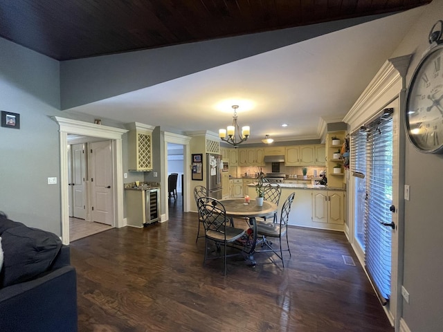 13745 S King Rd, Homer Glen, IL 60491 - dining area featuring a chandelier, wine cooler, dark wood-style floors, crown molding, and recessed lighting