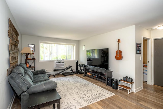 1461 N Winslowe Dr Unit 101, Palatine, IL 60074 - living area featuring wood finished floors and a wall mounted air conditioner