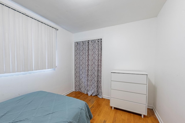 5124 W 32nd St, Cicero, IL 60804 - bedroom with light wood-type flooring and baseboards