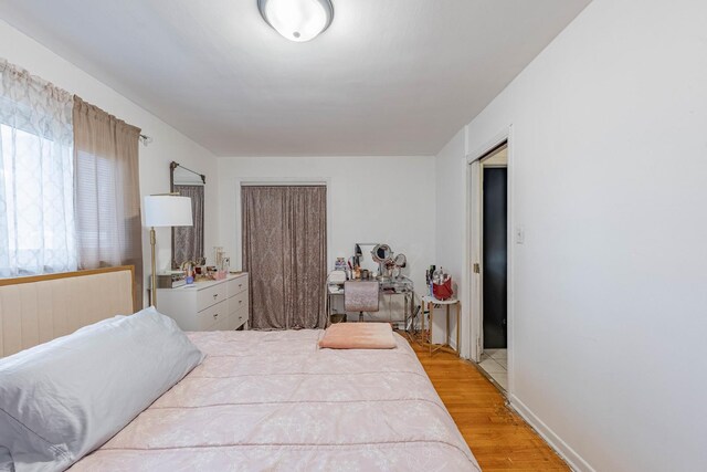 5124 W 32nd St, Cicero, IL 60804 - bedroom with light wood-style flooring and baseboards
