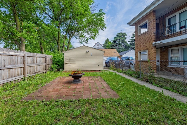 5124 W 32nd St, Cicero, IL 60804 - fenced backyard featuring an outdoor fire pit and a patio