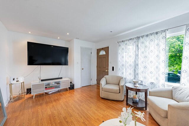 5124 W 32nd St, Cicero, IL 60804 - living room with light wood-style floors and recessed lighting