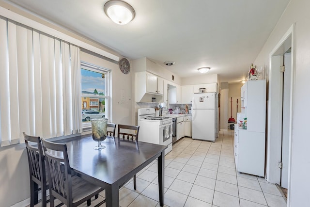 5124 W 32nd St, Cicero, IL 60804 - dining space featuring light tile patterned floors