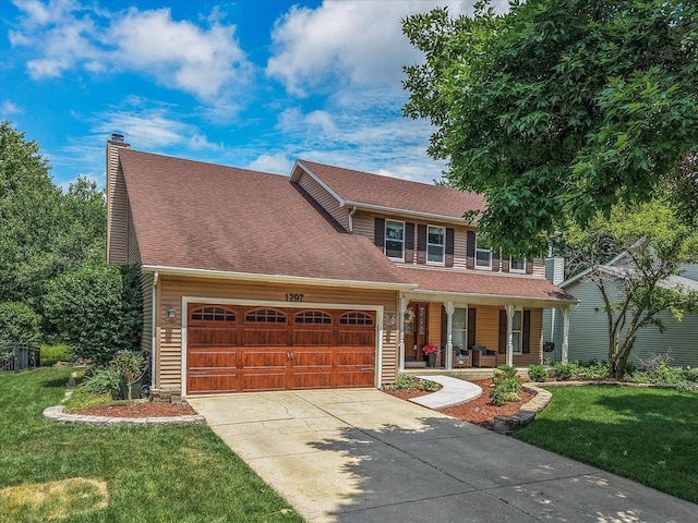 1297 Gregory Ct, Naperville, IL 60565 - view of front facade featuring covered porch, an attached garage, driveway, and a front lawn