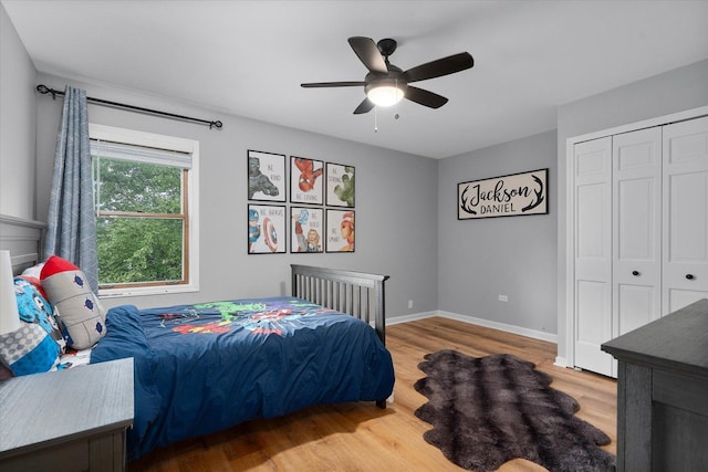 1297 Gregory Ct, Naperville, IL 60565 - bedroom featuring wood finished floors, a closet, and ceiling fan