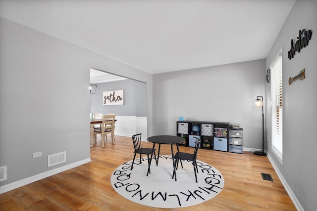 1297 Gregory Ct, Naperville, IL 60565 - dining room featuring wood finished floors and baseboards
