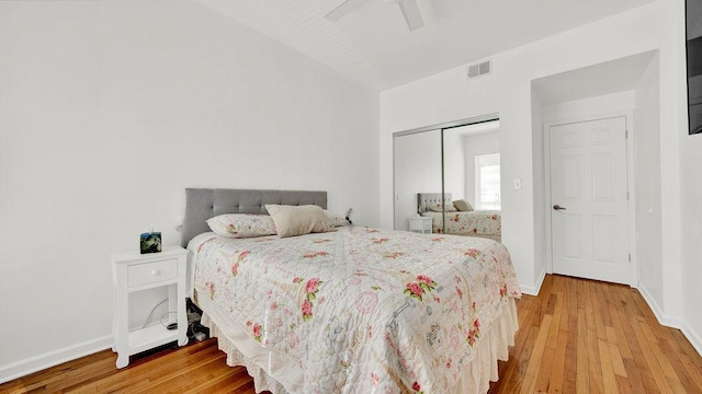 5150 S King Dr Unit A1, Chicago, IL 60615 - bedroom featuring light wood-style floors, a closet, and a ceiling fan