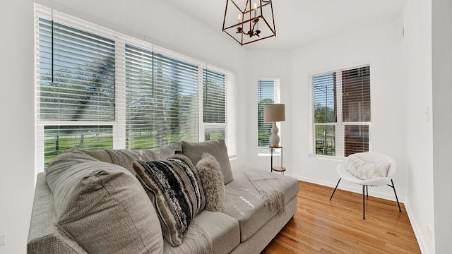 5150 S King Dr Unit A1, Chicago, IL 60615 - living area with a chandelier and wood finished floors