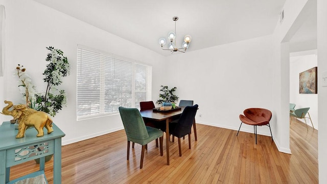 5150 S King Dr Unit A1, Chicago, IL 60615 - dining room with a chandelier and light wood finished floors
