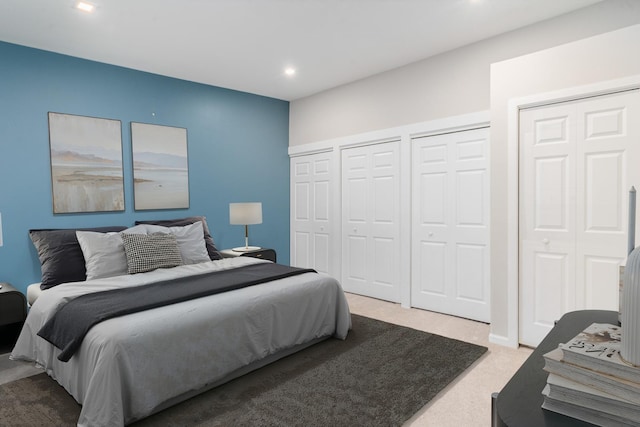 6021 Forest View Rd Unit 2C, Lisle, IL 60532 - bedroom with carpet, multiple closets, and recessed lighting