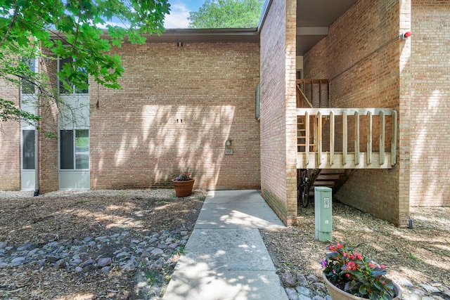 6021 Forest View Rd Unit 2C, Lisle, IL 60532 - view of exterior entry featuring brick siding