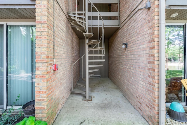 6021 Forest View Rd Unit 2C, Lisle, IL 60532 - view of exterior entry featuring brick siding