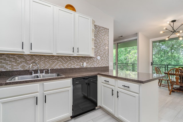 6021 Forest View Rd Unit 2C, Lisle, IL 60532 - kitchen featuring black dishwasher, a peninsula, backsplash, a chandelier, and white cabinets