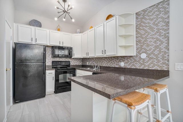 6021 Forest View Rd Unit 2C, Lisle, IL 60532 - kitchen featuring black appliances, open shelves, backsplash, and a peninsula