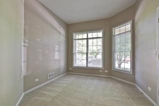 3942 Honeymoon Rdg, Lake In The Hills, IL 60156 - unfurnished room featuring plenty of natural light