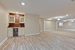 3942 Honeymoon Rdg, Lake In The Hills, IL 60156 - bar area featuring beverage cooler, light wood-type flooring, and recessed lighting