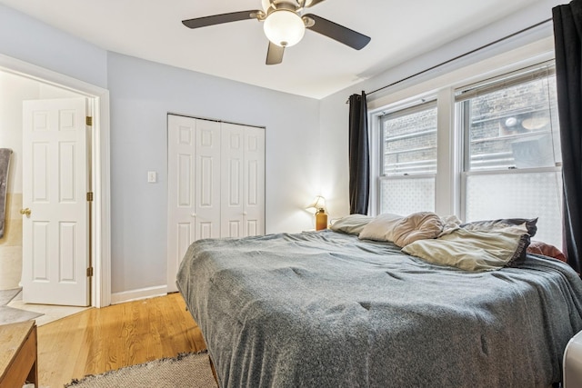 1214 W Early Ave Unit 1E, Chicago, IL 60660 - bedroom featuring light wood-type flooring, a closet, and ceiling fan