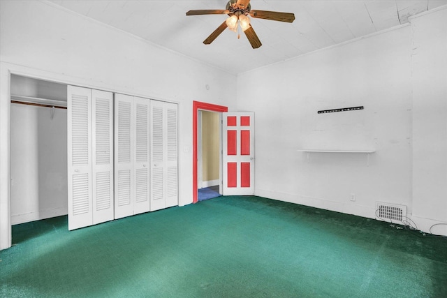 403 E Cooke St, Mount Pulaski, IL 62548 - unfurnished bedroom with carpet floors, a closet, and a ceiling fan