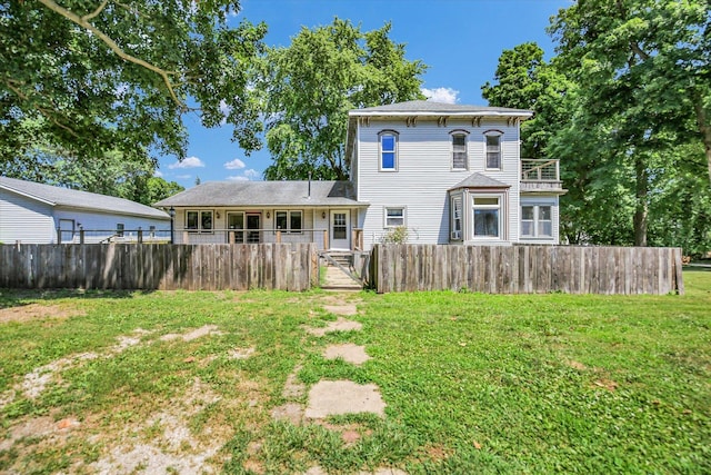 403 E Cooke St, Mount Pulaski, IL 62548 - back of property with a balcony