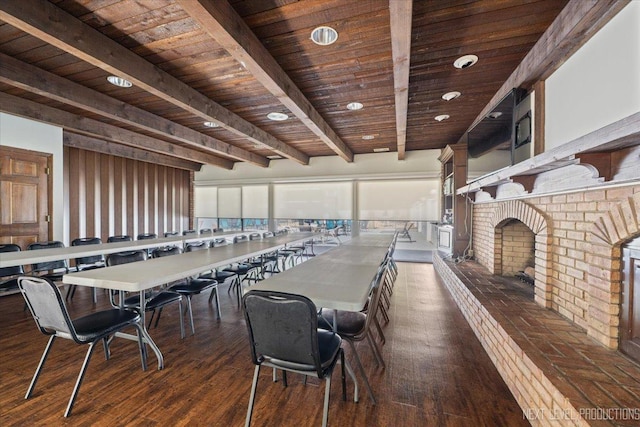 1050 N Farnsworth Ave Unit 202, Aurora, IL 60505 - dining area featuring a wooden ceiling with exposed beams, recessed lighting, wood finished floors, and a brick fireplace