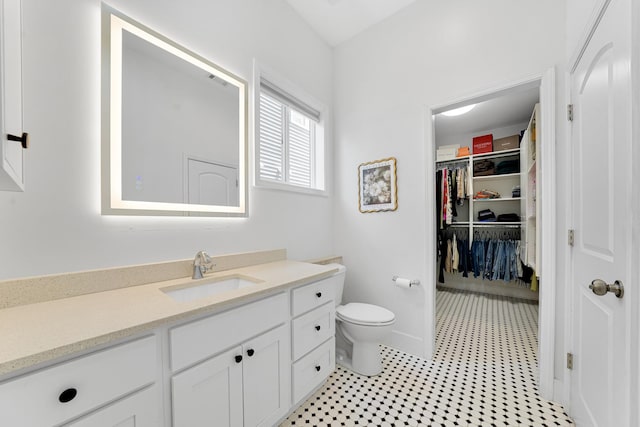 228 Juneway Ter, Lake Bluff, IL 60044 - bathroom featuring vanity and a spacious closet