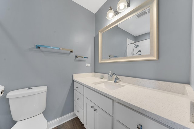 228 Juneway Ter, Lake Bluff, IL 60044 - bathroom with vanity, wood finished floors, and a shower