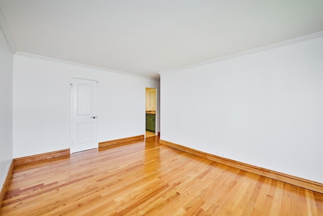 7033 N Kedzie Ave Unit 1706, Chicago, IL 60645 - spare room featuring light wood-style flooring and crown molding