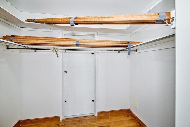 7033 N Kedzie Ave Unit 1706, Chicago, IL 60645 - basement featuring light wood-style floors
