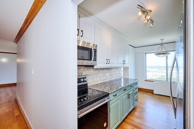 7033 N Kedzie Ave Unit 1706, Chicago, IL 60645 - kitchen with stainless steel appliances, white cabinetry, backsplash, light wood finished floors, and crown molding