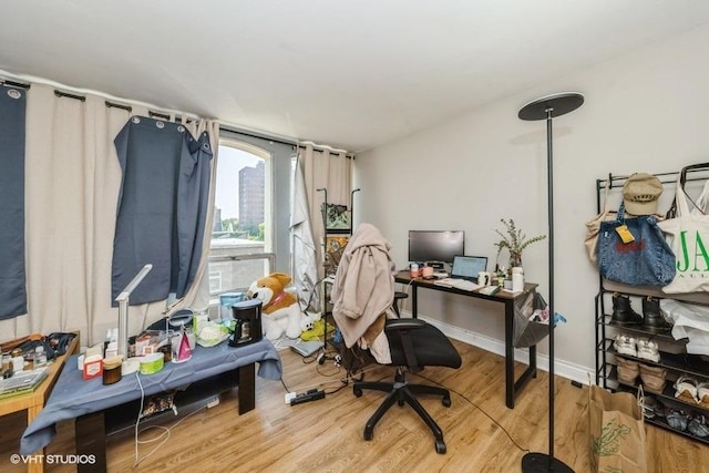 1400 E 55th Pl Unit 304S, Chicago, IL 60637 - home office featuring wood finished floors and baseboards