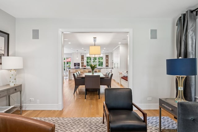624 Laurel Ave, Wilmette, IL 60091 - living room featuring light wood finished floors and recessed lighting