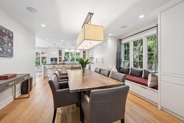 624 Laurel Ave, Wilmette, IL 60091 - dining area with light wood-style floors and recessed lighting