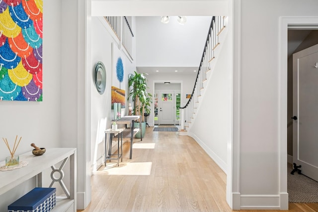624 Laurel Ave, Wilmette, IL 60091 - entryway with light wood finished floors and stairs
