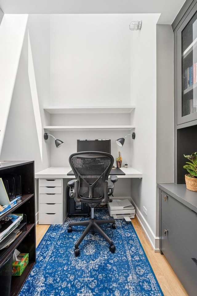 624 Laurel Ave, Wilmette, IL 60091 - office area featuring light wood-style flooring and baseboards
