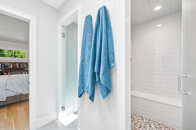 624 Laurel Ave, Wilmette, IL 60091 - full bath with a shower stall, connected bathroom, recessed lighting, and wood finished floors
