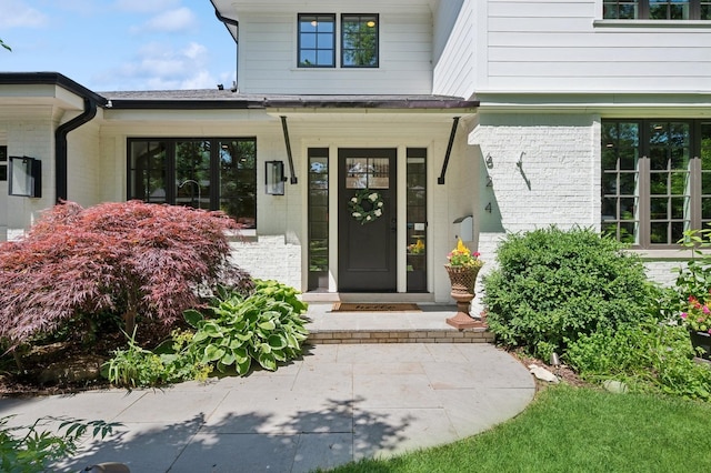 624 Laurel Ave, Wilmette, IL 60091 - property entrance featuring brick siding and a porch
