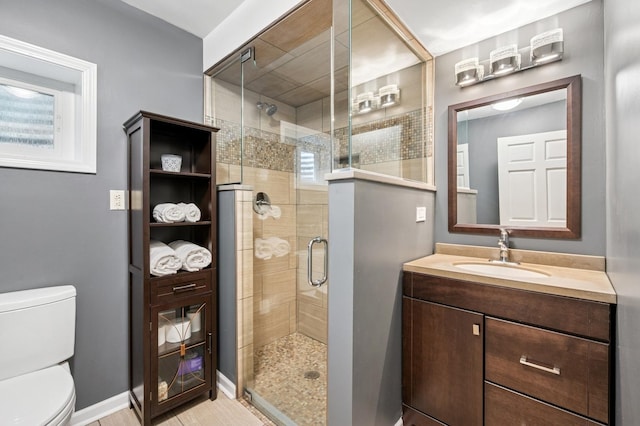 624 Laurel Ave, Wilmette, IL 60091 - bathroom featuring vanity and a stall shower