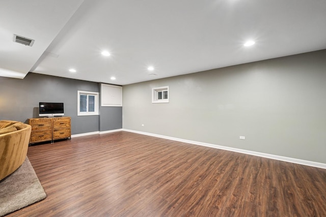 624 Laurel Ave, Wilmette, IL 60091 - unfurnished living room with dark wood finished floors and recessed lighting