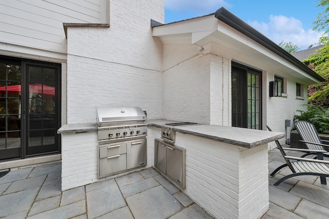 624 Laurel Ave, Wilmette, IL 60091 - view of patio with an outdoor kitchen