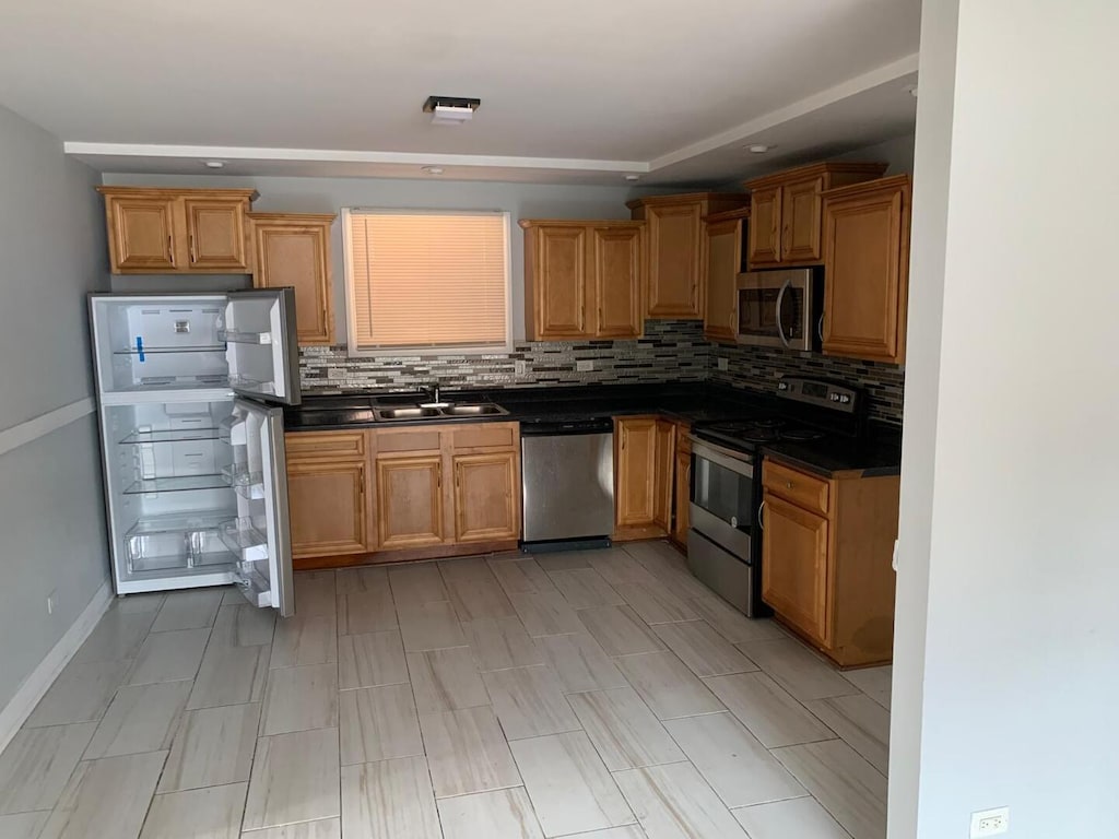 4115 S Harlem Ave Unit Ge, Stickney, IL 60402 - kitchen with appliances with stainless steel finishes, dark countertops, backsplash, and recessed lighting