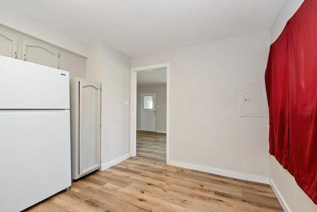 3645 177th Pl, Lansing, IL 60438 - kitchen with freestanding refrigerator, light wood-style flooring, and electric panel