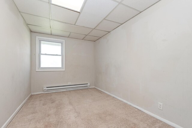 3645 177th Pl, Lansing, IL 60438 - spare room with baseboard heating, carpet floors, and a paneled ceiling